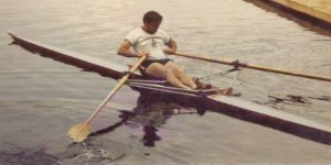 Jim Joy teaching from a single shell at the Craftsbury Sculling Center.